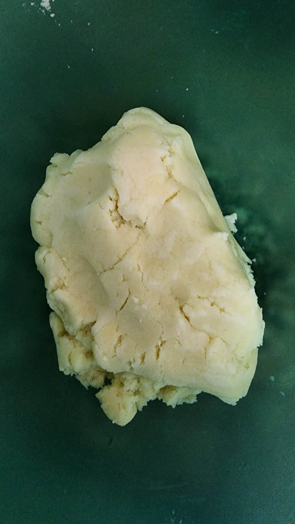 A large ball of corn tortilla dough