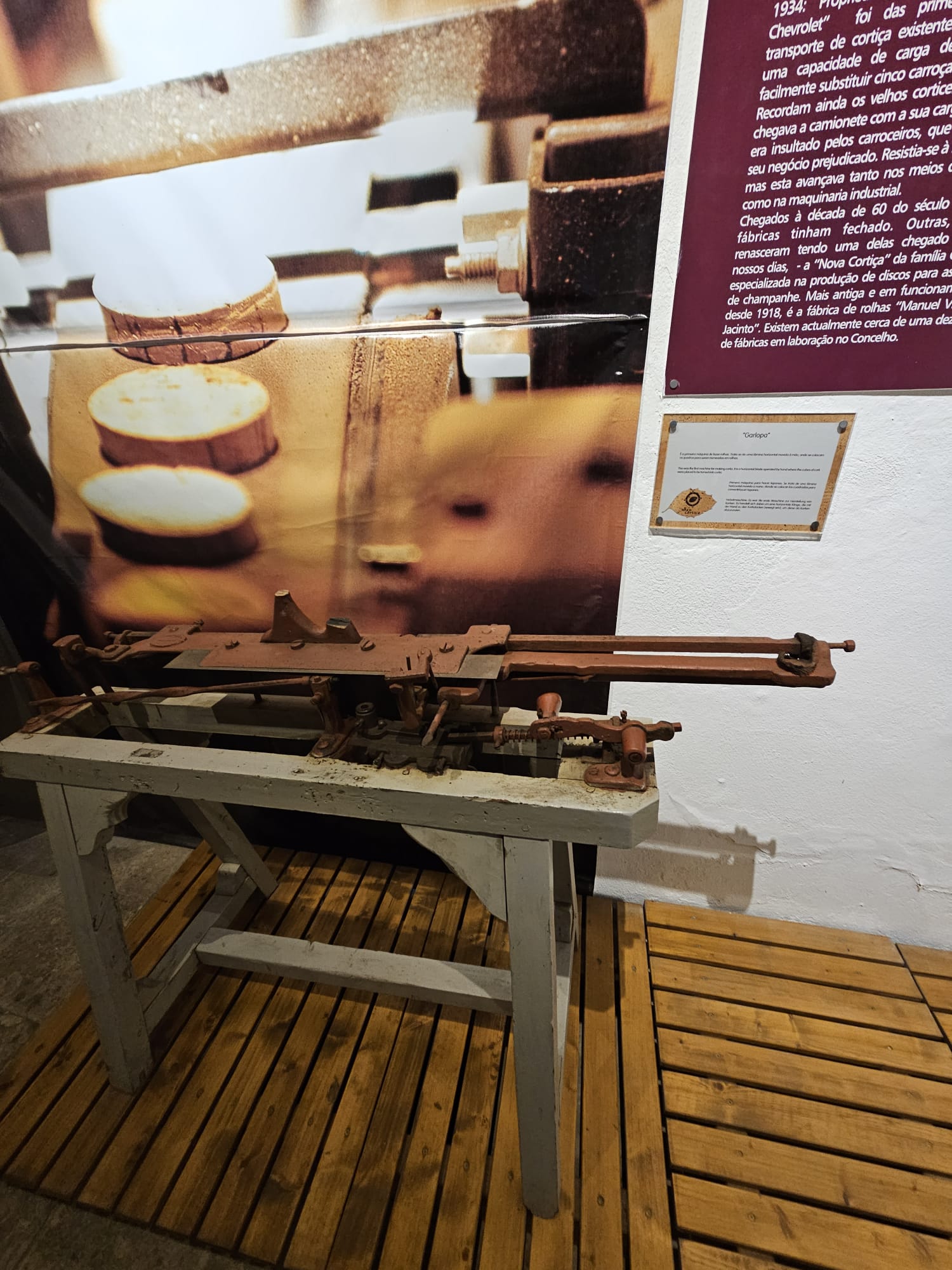 Antique cork cutting machine on display at a Portuguese cork museum