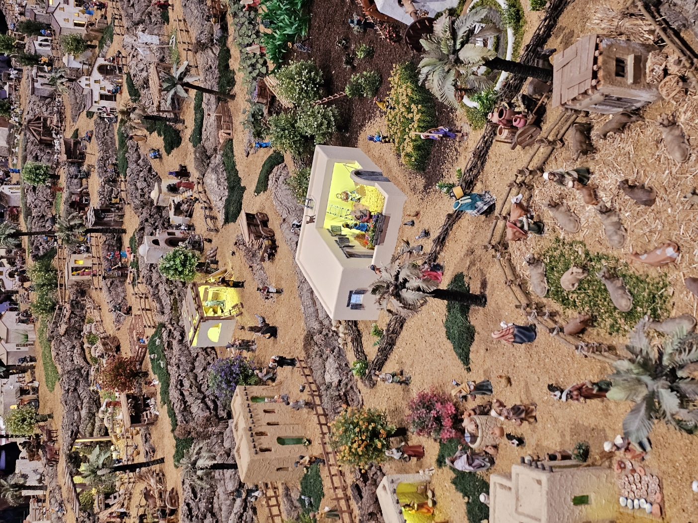 Close up detail of miniature figures and buildings in Portugal's largest nativity scene