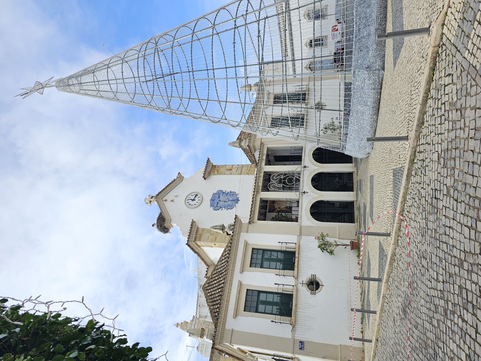 Igreja Matriz de Nossa Senhora do Rosario church with a Christmas tree structure in Olhão Portugal
