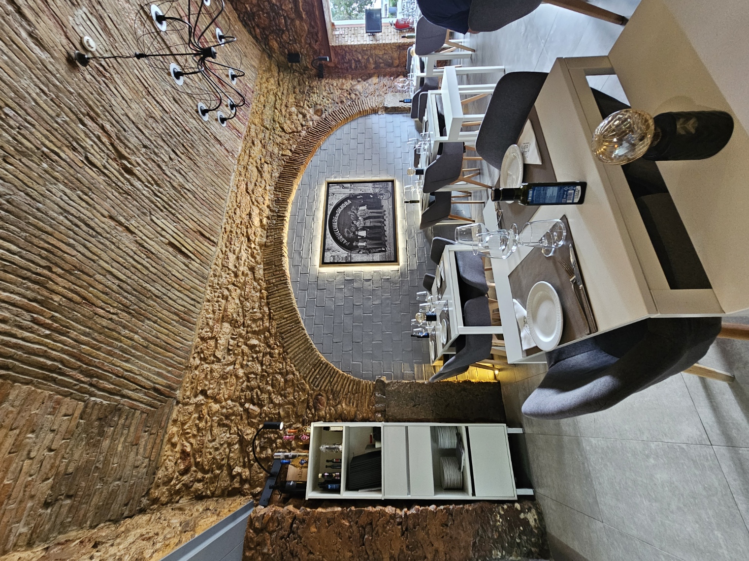 Rustic stone arched interior dining room of Pizza na Pedra restaurant in Olhão Portugal
