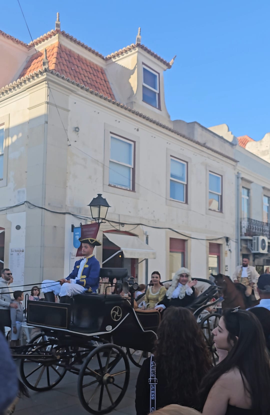 Historical reenactor dressed as the Marquis of Pombal in a parade at a Portuguese festival