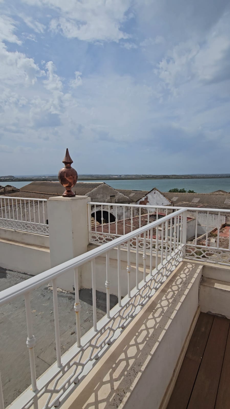 Rooftop terrace view of Ayamonte rooftops and the Guadiana River from Casa Verde apartments
