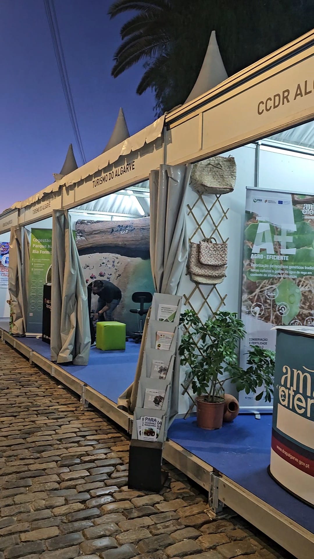 Educational booth for the Algarve region at the Mediterranean Diet Fair with informational displays and sustainable agriculture exhibits