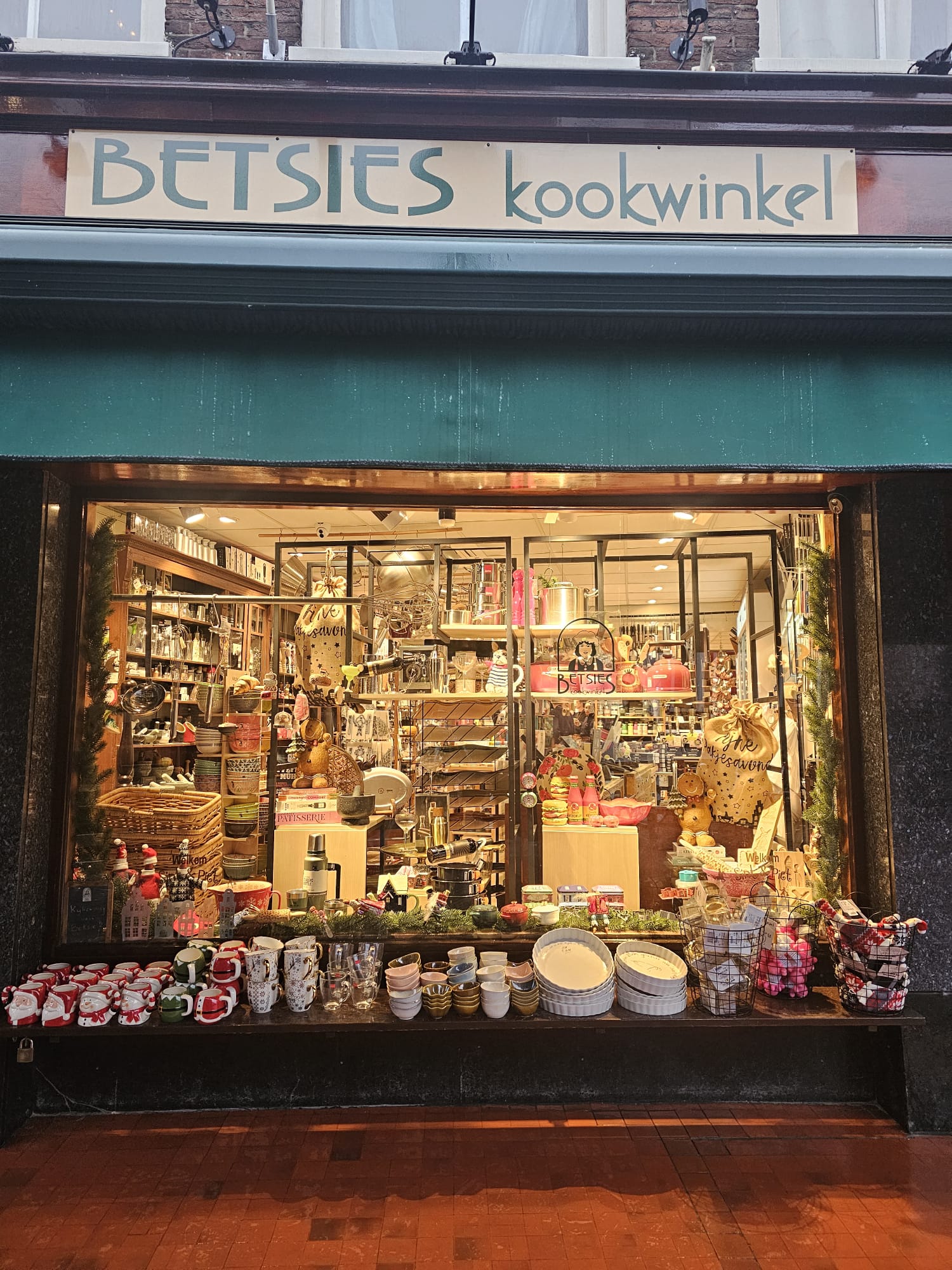 Storefront window display of Betsies Kookwinkel kitchen shop on a Utrecht street